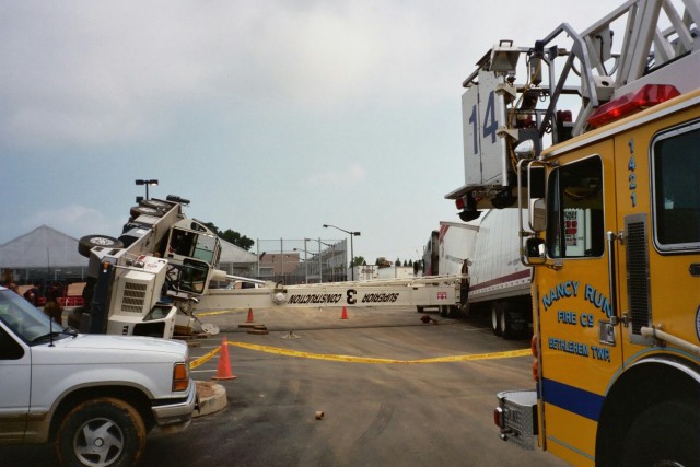 14 Truck checking hazards at a crane accident.